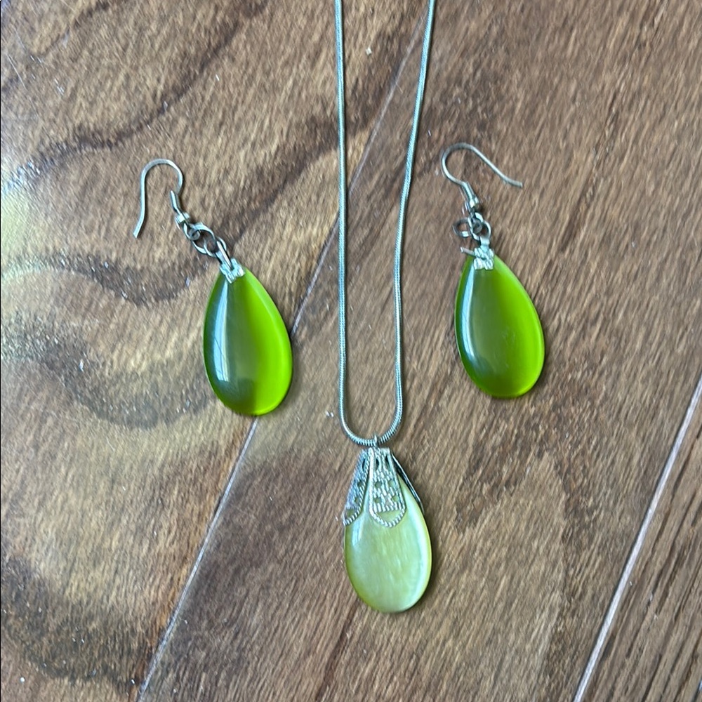 Green Teardrop Earrings with Luminous Glow